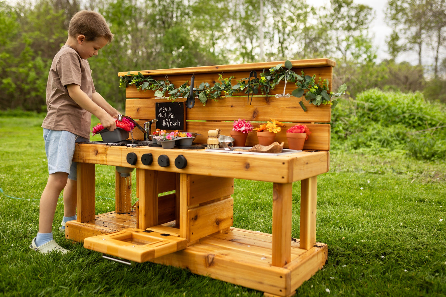 Centered Mud Kitchen with Oven and Working Sink