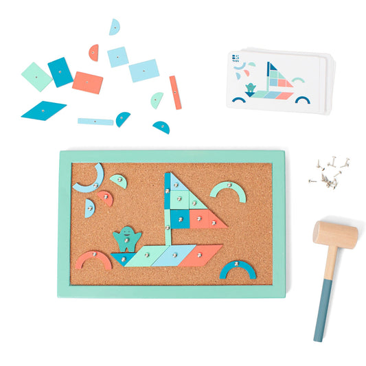 Children's geometric shape puzzle with a wooden hammer on a white background
