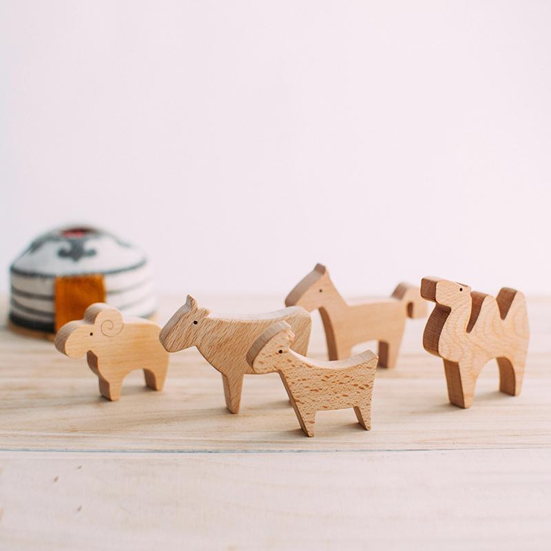 https://woodwoodtoys.ca/cdn/shop/products/five-wooden-animals-by-avdar-wood-wood-toys-canada-785825.jpg?v=1597775458&width=1445